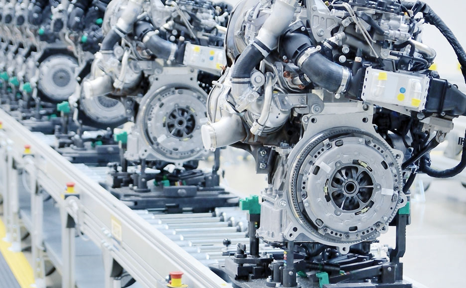 Manufacturing engines in an assembly line in a factory