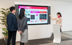 Image of an attendant guiding a customer