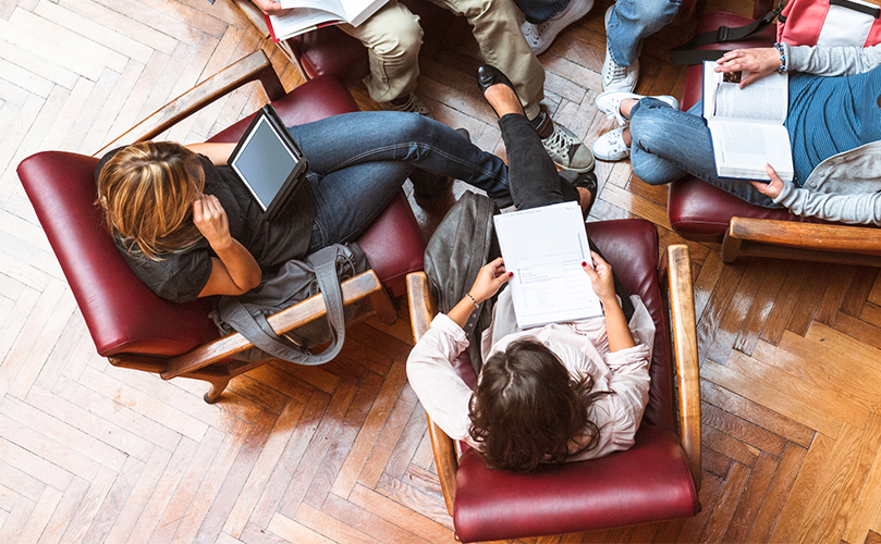 sitting in a chair, contemplating